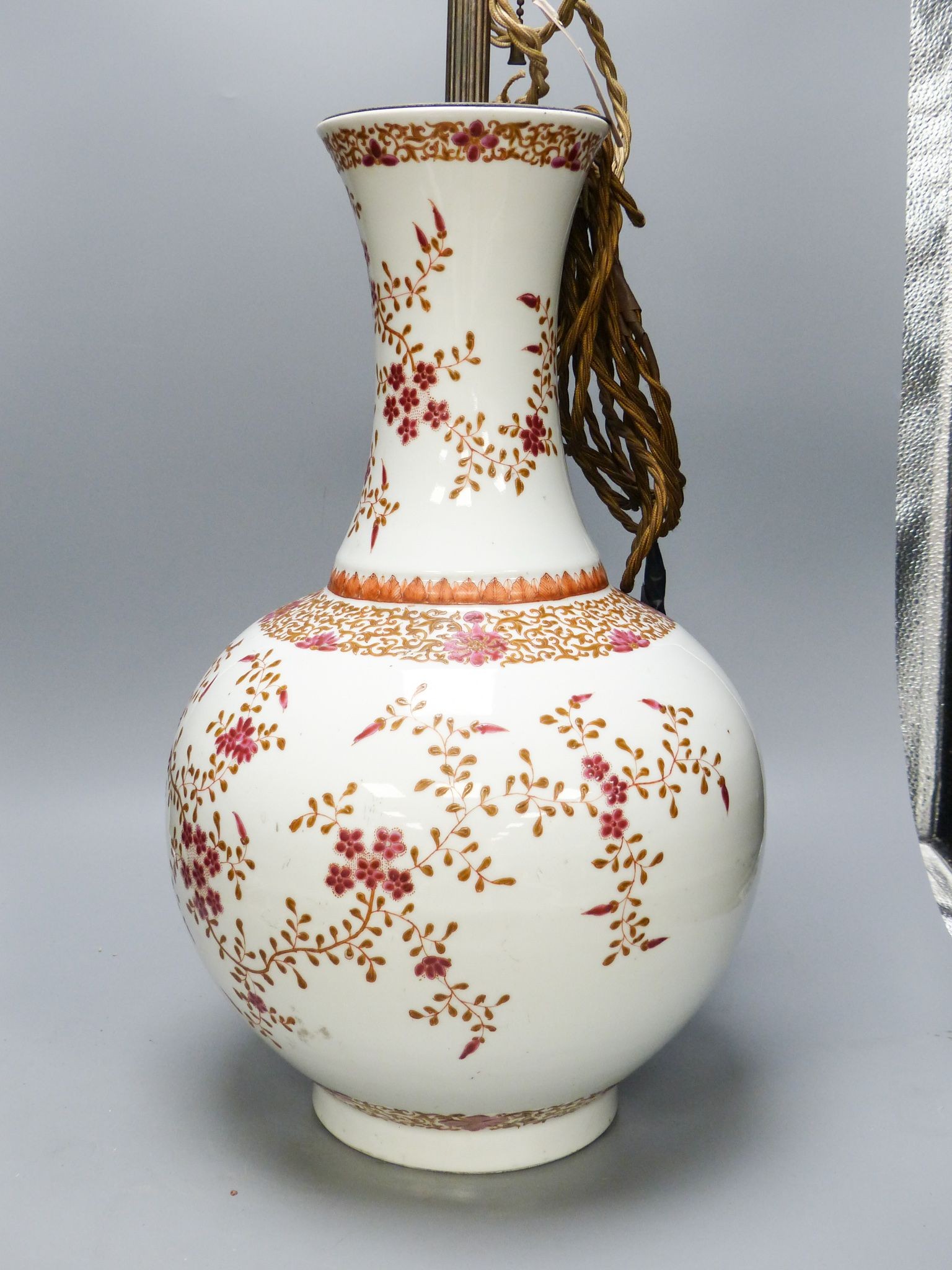 A Chinese famille rose ‘prunus’ vase, four character Qianlong mark in iron red but probably Guangxu period, height overall 83cm